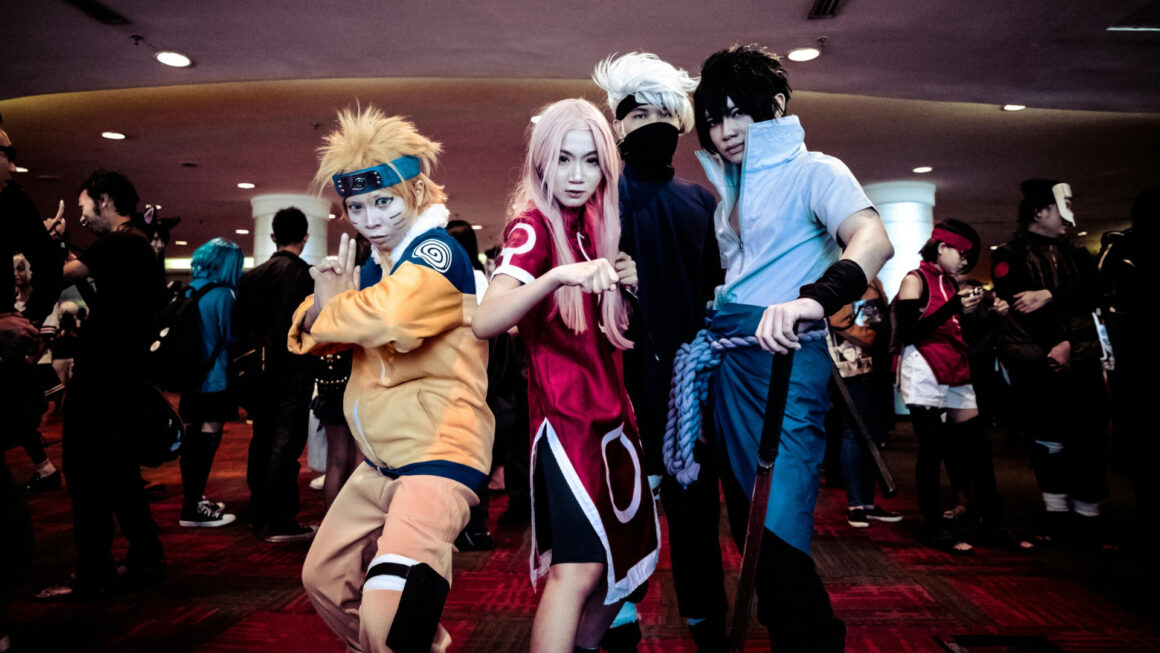 Cosplayers dressed as Naruto, Sakura, Kakashi and Sasuke from the popular anime, Naruto.